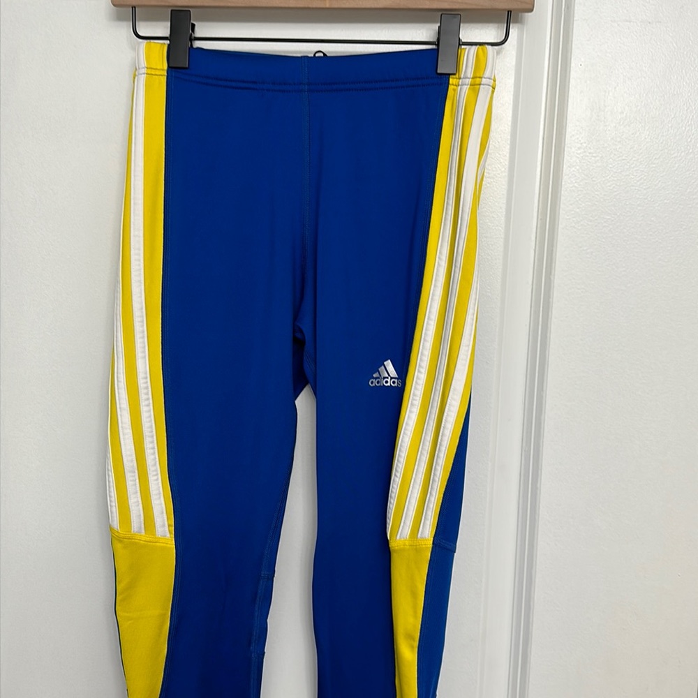 Blue, yellow and white adidas jogger. Size S.